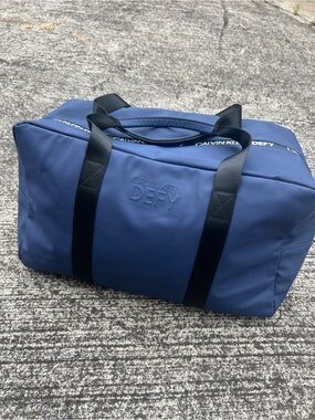 Calvin Klein Defy Duffel Bag in Navy with Black Straps